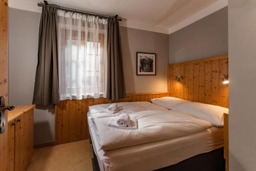 Posteľ alebo postele v izbe v ubytovaní Appartements Planai by Schladmingurlaub