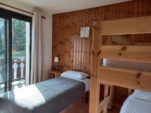 Ένα ή περισσότερα κρεβάτια σε δωμάτιο στο HOTEL LE CRET