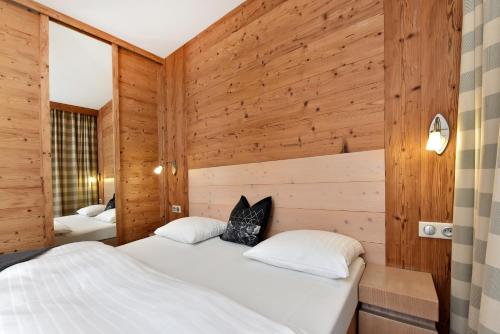 Ένα ή περισσότερα κρεβάτια σε δωμάτιο στο APLEND Hotel Kukučka