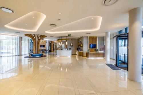 Ο χώρος του λόμπι ή της ρεσεψιόν στο Radisson Hotel and Convention Centre OR Tambo Airport