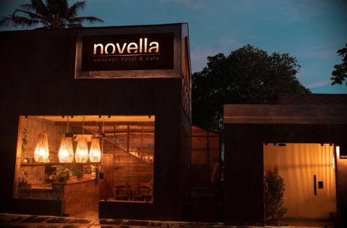a restaurant with a sign that reads novalia at Novella in Varkala