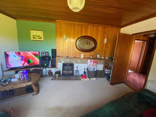 Μια τηλεόραση ή/και κέντρο ψυχαγωγίας στο Shalom bungalow Falcarragh Mountain View Oldtown
