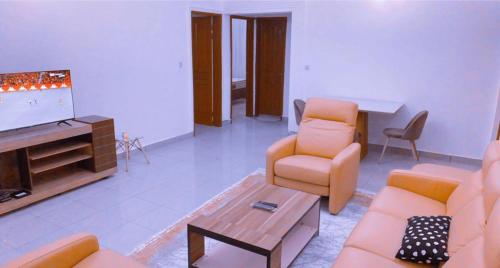 Χώρος καθιστικού στο Les Residences de la providence-Appart Hotel Obobogo