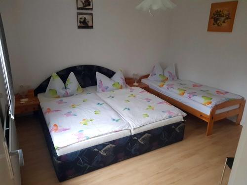 Postel nebo postele na pokoji v ubytování Bungalow Weidling