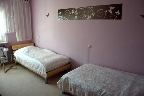 Postel nebo postele na pokoji v ubytování Ferienwohnung "Unger"