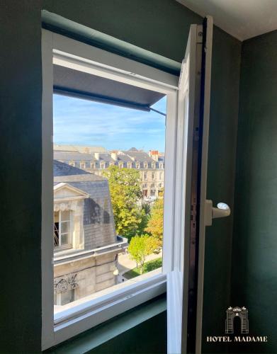 Balcon ou terrasse dans l'établissement Hôtel Madame