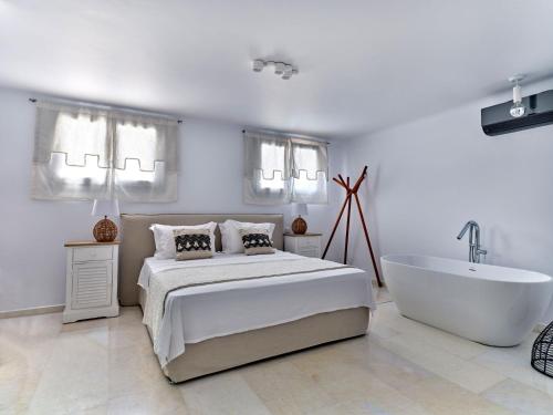Ένα ή περισσότερα κρεβάτια σε δωμάτιο στο Costa Pounda Villas with private pools