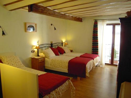 Postel nebo postele na pokoji v ubytování La Casa de la Abuela Clotilde