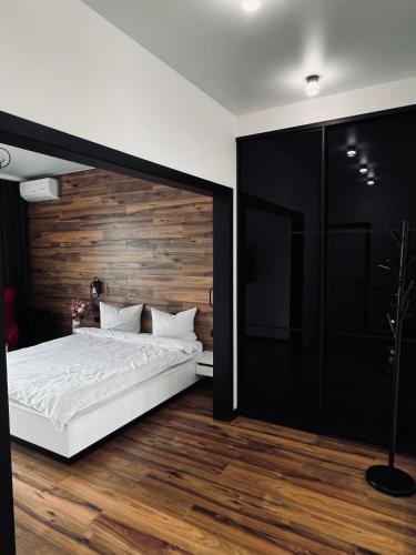 Ένα ή περισσότερα κρεβάτια σε δωμάτιο στο Exclusive apartment Новобудова ЖК Театральний ЦЕНТР