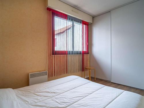 En eller flere senge i et værelse på Appartement Hendaye, 2 pièces, 5 personnes - FR-1-2-299
