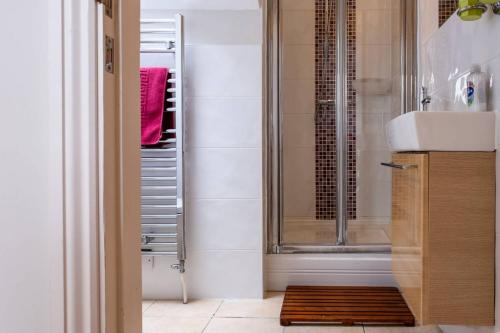 a bathroom with a shower and a sink at Number Two in Southampton