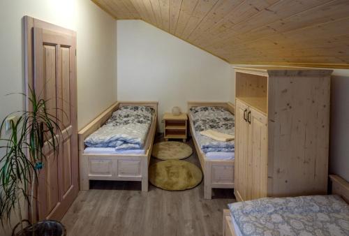 Tempat tidur dalam kamar di Apartmán Elizabeth