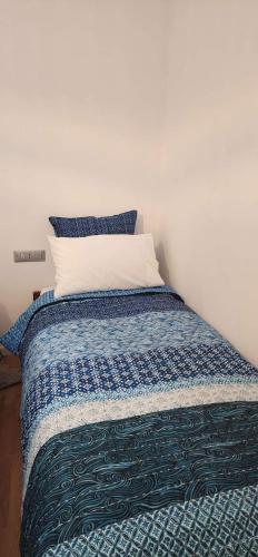 Letto o letti in una camera di Appartamento Agrumi