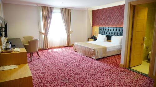 Кровать или кровати в номере Vois Hotel Atasehir & SPA