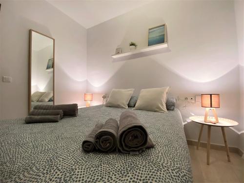 Posteľ alebo postele v izbe v ubytovaní Apartamento Felipe Neri 10