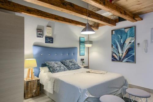 Una cama o camas en una habitación de Apartamento Plaza de España 5