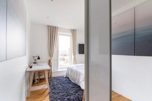 Una cama o camas en una habitación de Penthouse with amazing views of Copenhagen!MH74