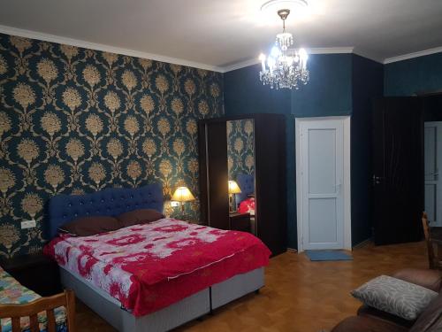 Postel nebo postele na pokoji v ubytování Romson Hotel