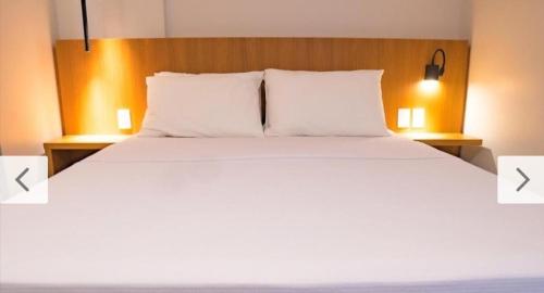 Postel nebo postele na pokoji v ubytování Apt RESORT SALINAS PREMIUM