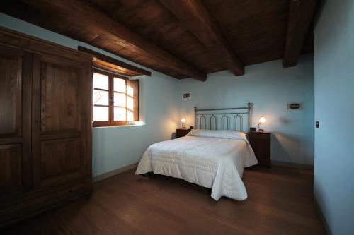 Una cama o camas en una habitación de Agriturismo Terrazza sul Parco