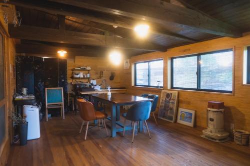 a dining room with a table and chairs at Guest House Tamaki - Vacation STAY 53922v in Furuichi