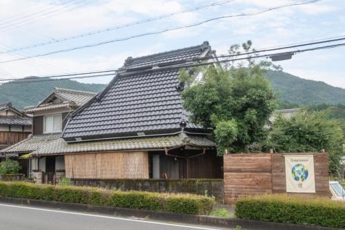 a house on the side of the road at Guest House Tamaki - Vacation STAY 53922v in Furuichi