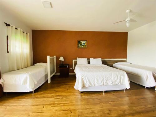 Postel nebo postele na pokoji v ubytování Paraty Hotel Fazenda & Spa