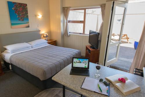 Postel nebo postele na pokoji v ubytování Howick Motor Lodge