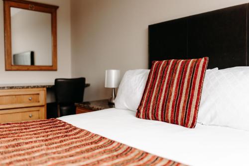 Ένα ή περισσότερα κρεβάτια σε δωμάτιο στο Mountain View Lodge