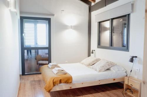 Postel nebo postele na pokoji v ubytování CASA LLOP a Paüls, Vall Fosca