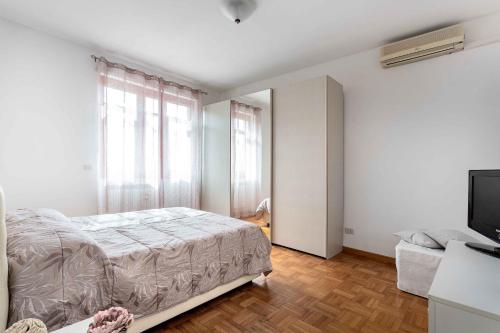 Giường trong phòng chung tại VIBE Apartment Rome