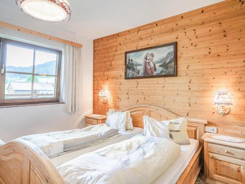 מיטה או מיטות בחדר ב-Weberhof Top 4