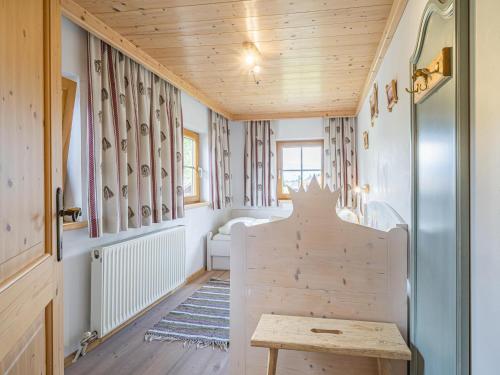 a small room with a table and a bench at Weberhof Top 1-2 in Brixen im Thale