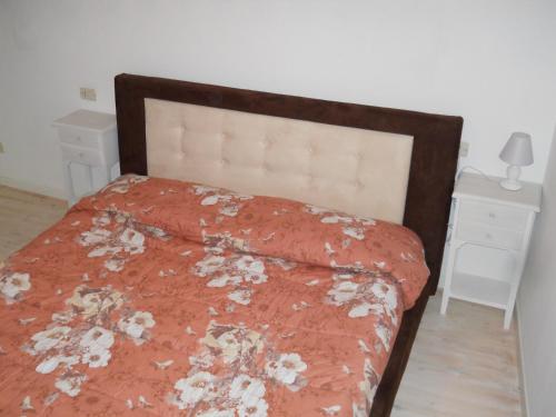 Ένα ή περισσότερα κρεβάτια σε δωμάτιο στο Vacanze In Tesino
