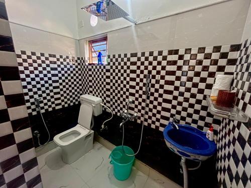 Koupelna v ubytování Satrangi Homestay Kolkata