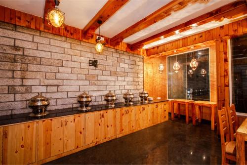 Billede fra billedgalleriet på Tripli Hotels Stone House Cottage i Manāli