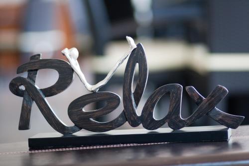 a metal sign that says spa on a table at Villaggio La Pescaccia in San Clemente