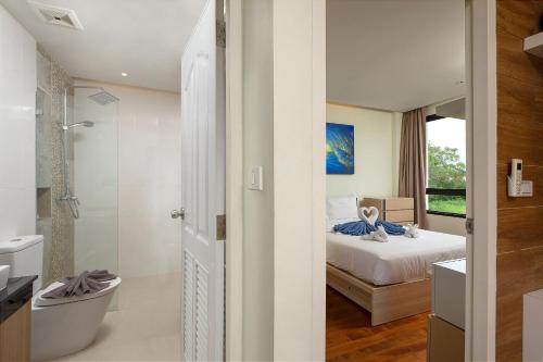 Et badeværelse på LAGO APARTMENTS BY TROPICLOOK