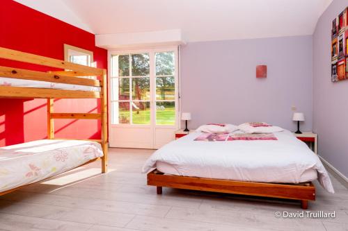a bedroom with a bed and a bunk bed at Maison de 6 chambres avec jardin amenage et wifi a Lametz in Lametz