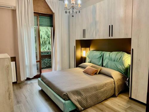 Giường trong phòng chung tại Appartamento Santa Teresa, fiera/centro Verona