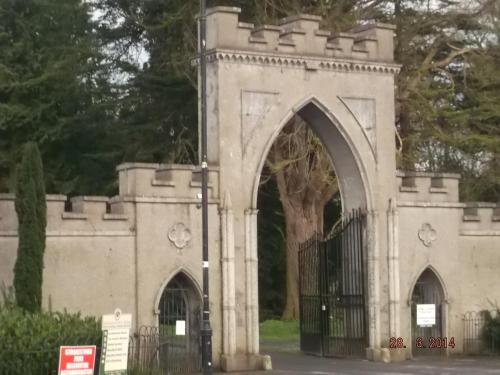 an entrance to a building with a gate at Westgate House B&B Strokestown in Strokestown