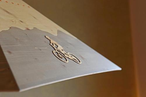 a piece of paper with a pair of scissors on it at Naturpension Max-Hütte in Breitenbrunn