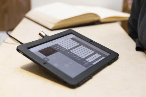 a tablet computer sitting on top of a table at Kydon The Heart City Hotel in Chania Town