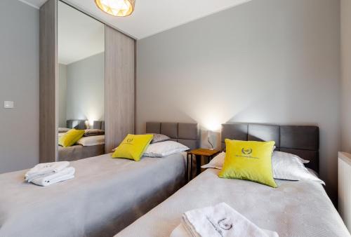 Posteľ alebo postele v izbe v ubytovaní Apartamenty Gdansk EU - Angielska Grobla OLD TOWN Gdańsk Apartament - z 2 sypialniami - Stylowy