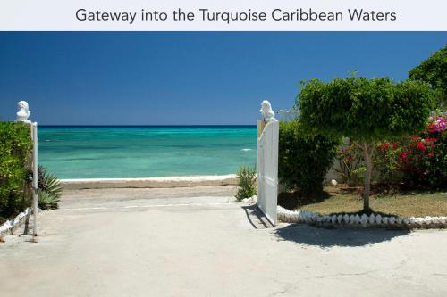 a gate way into the turquoise carribean waters at Calypso Villa Jamaica in Montego Bay