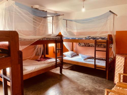 Postel nebo postele na pokoji v ubytování Yes Hostel