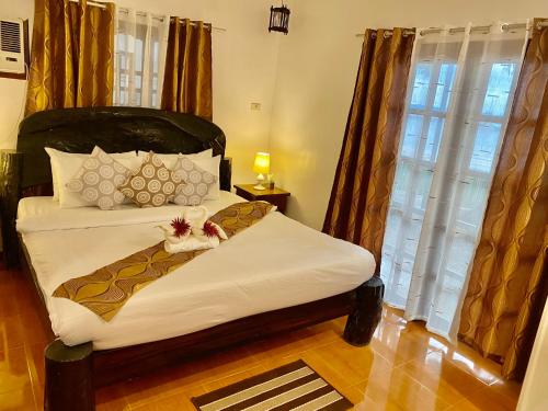 Ένα ή περισσότερα κρεβάτια σε δωμάτιο στο Sophias Beach Guest House