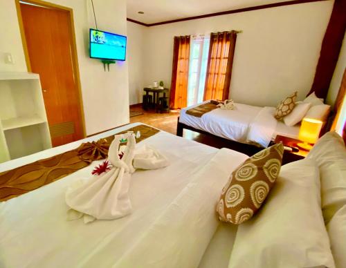 Ένα ή περισσότερα κρεβάτια σε δωμάτιο στο Sophias Beach Guest House