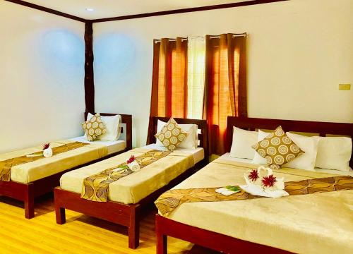 Ένα ή περισσότερα κρεβάτια σε δωμάτιο στο Sophias Beach Guest House