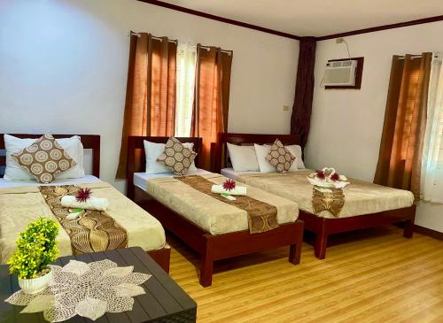 Ένα ή περισσότερα κρεβάτια σε δωμάτιο στο Sophias Beach Guest House